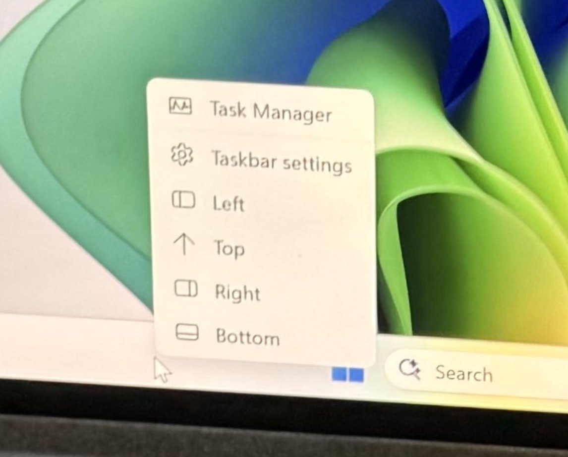 Buttons to move taskbar in Windows 11