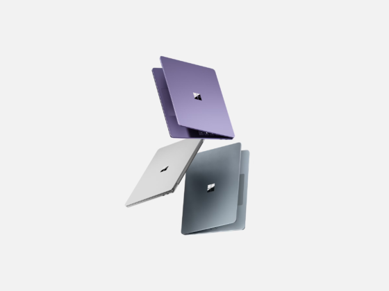 Several Surface Laptop devices in various colors.