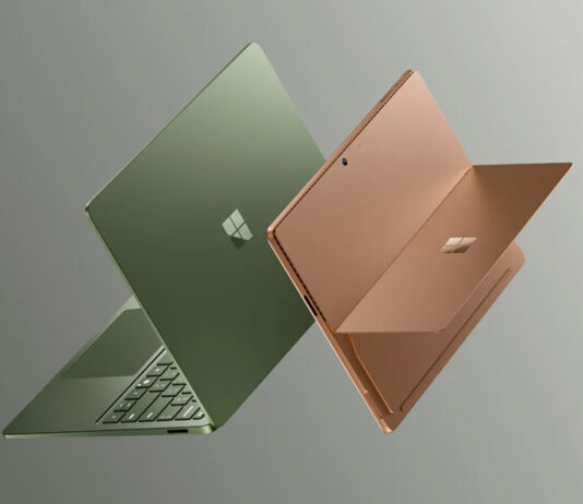 Microsoft Surface Pro 12 and Surface Laptop 8 facing back to back on a greyscale background