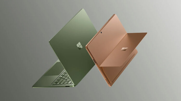 microsoft-surface-pro-surface-laptop-2026 Microsoft Surface Pro 12 and Surface Laptop 8 facing back to back on a greyscale background